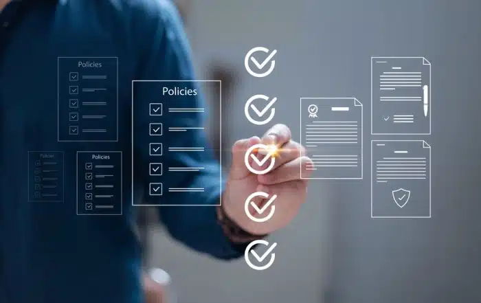 man checking off items on his annual rental property policy review_NREIG